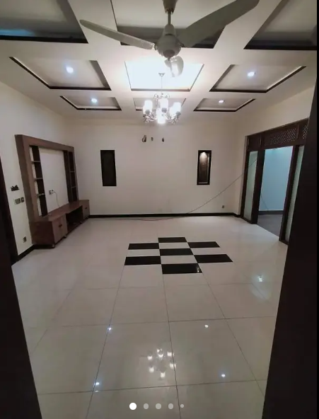 10 Marla Full House with Basement is Available for Sale in Overseas A Block, Bahria Town, Lahore.